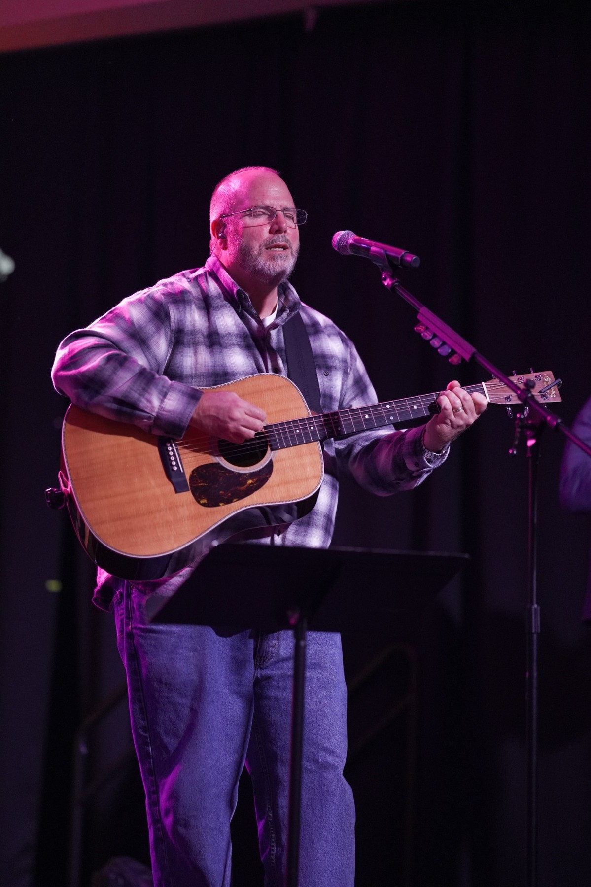 Steve playing acoustic guitar